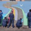 Неповнолітні засуджені розмалювали паркан колонії яскравим графіті